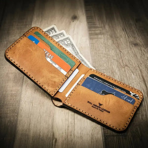 Tan full-grain leather bifold wallet with multiple card slots by Bull Sheath Leather.