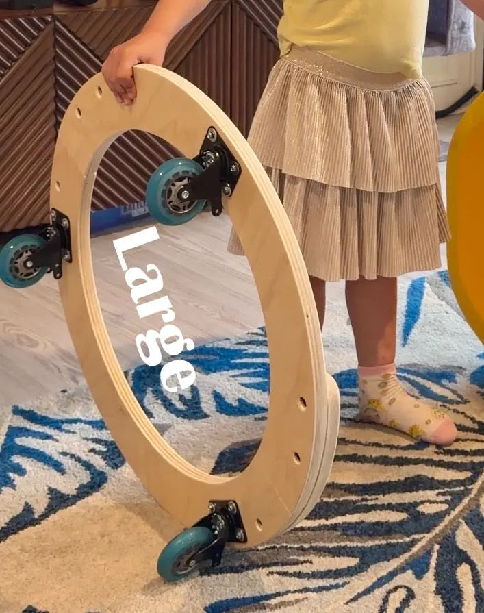 Close up of rolling bases for handmade wooden scooter board