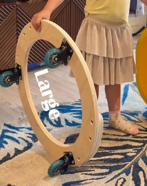 Close up of rolling bases for handmade wooden scooter board