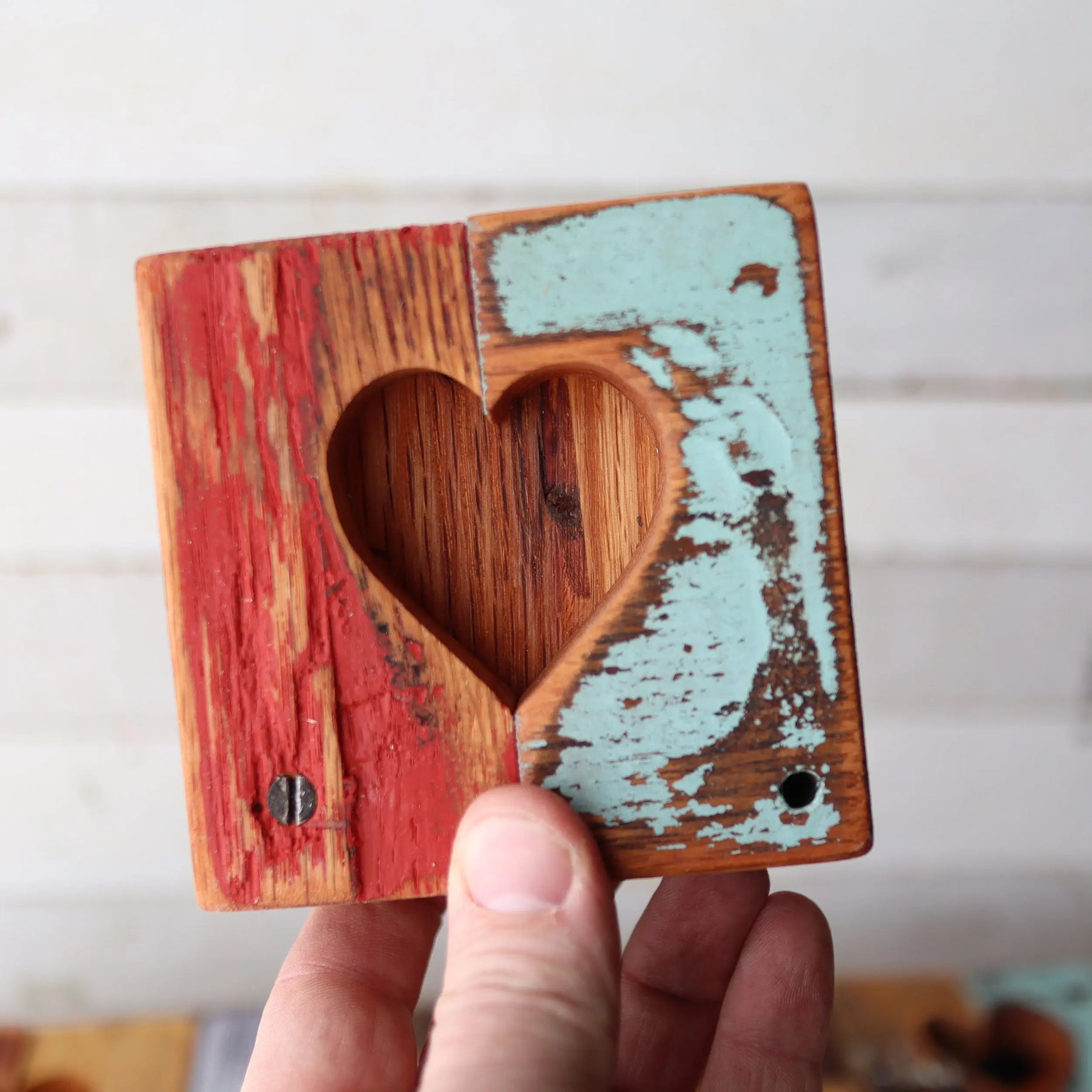 Reclaimed wood tile with heart cutout, red and aqua distressed paint
