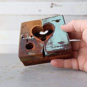 Two-toned rustic wooden heart with a center cut-out.