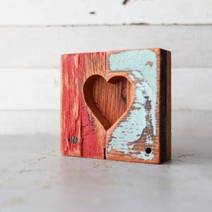 Two-piece wooden heart decoration with distressed red and blue paint