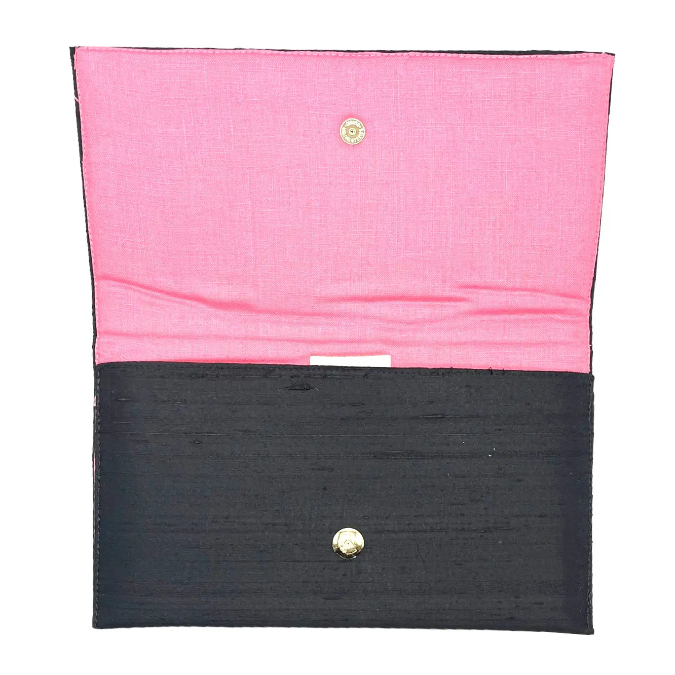 Black clutch with pink linen interior and gold snap closure