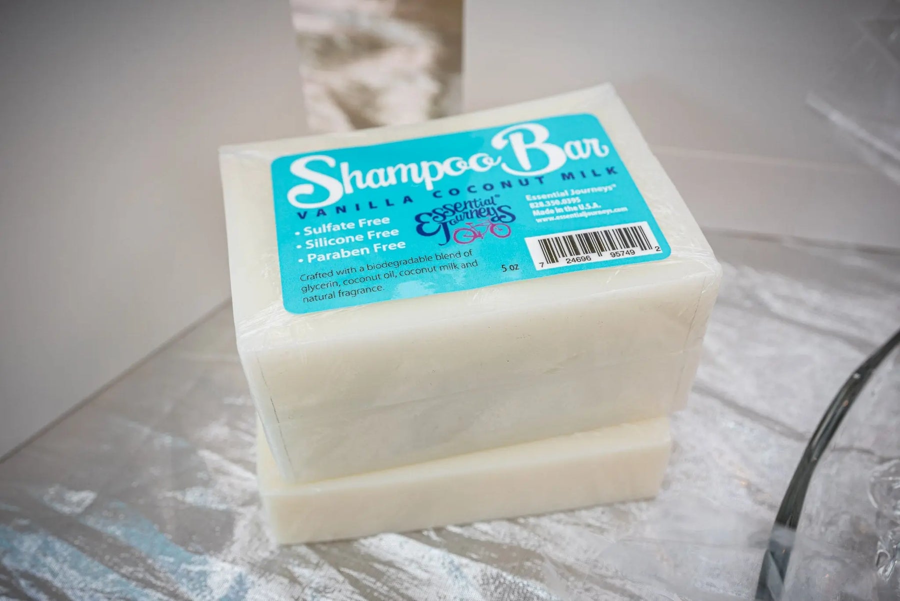 Shampoo bar with vanilla coconut milk scent, labeled sulfate-free and paraben-free.