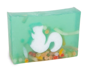 Green translucent soap with embedded white squirrel figure and colorful beads