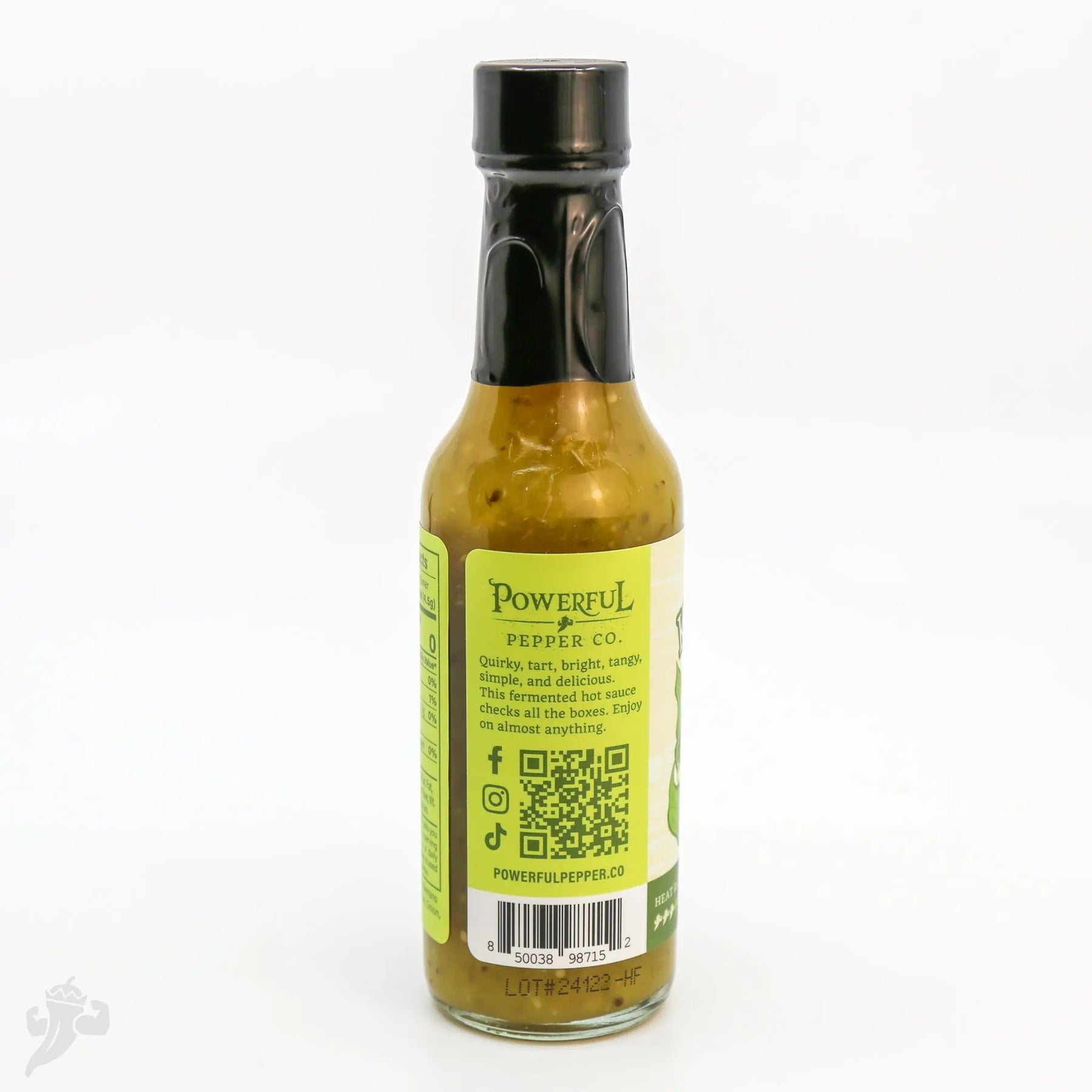 Green label bottle of Powerful Pepper Co. hot sauce with product description visible.