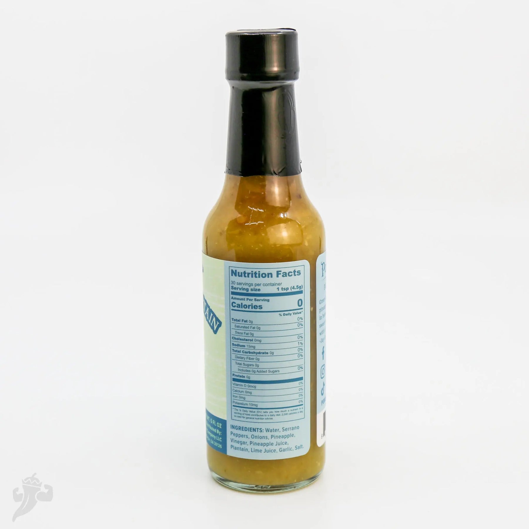 Bottle of Serrano Pineapple Plantain Hot Sauce from Powerful Pepper Company showing nutrition facts.
