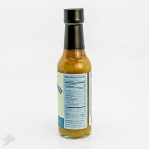Bottle of Serrano Pineapple Plantain Hot Sauce from Powerful Pepper Company showing nutrition facts.