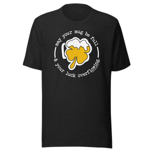 Black t-shirt with a shamrock beer mug design and the text "May your mug be full & your luck overflowing."