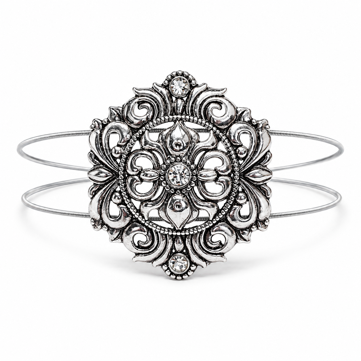 Silver medallion bracelet on white background