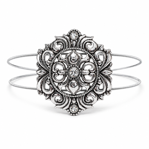 Silver medallion bracelet on white background