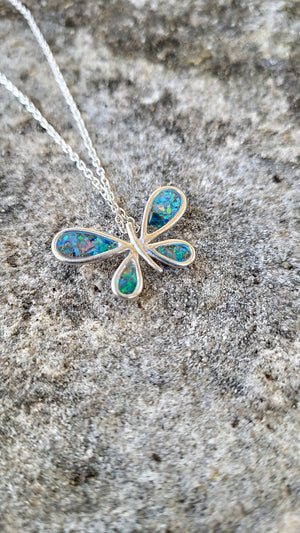Sterling silver butterfly pendant with ashes inside, on a chain. Memorial jewelry.