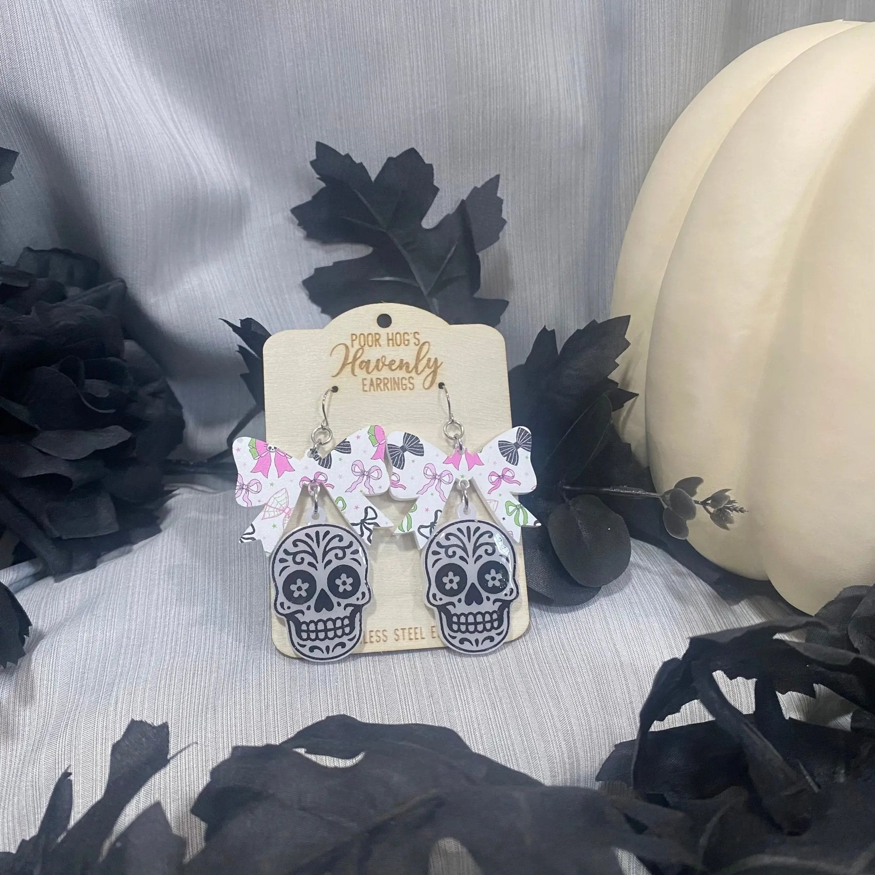Sugar Skull with Festive Bow Acrylic Dangle Earrings for Halloween Poor Hog Customs