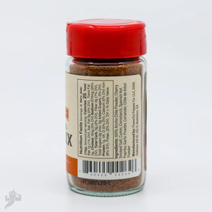 Powerful Pepper Company Taco Mix spice blend in a glass jar with a red lid.