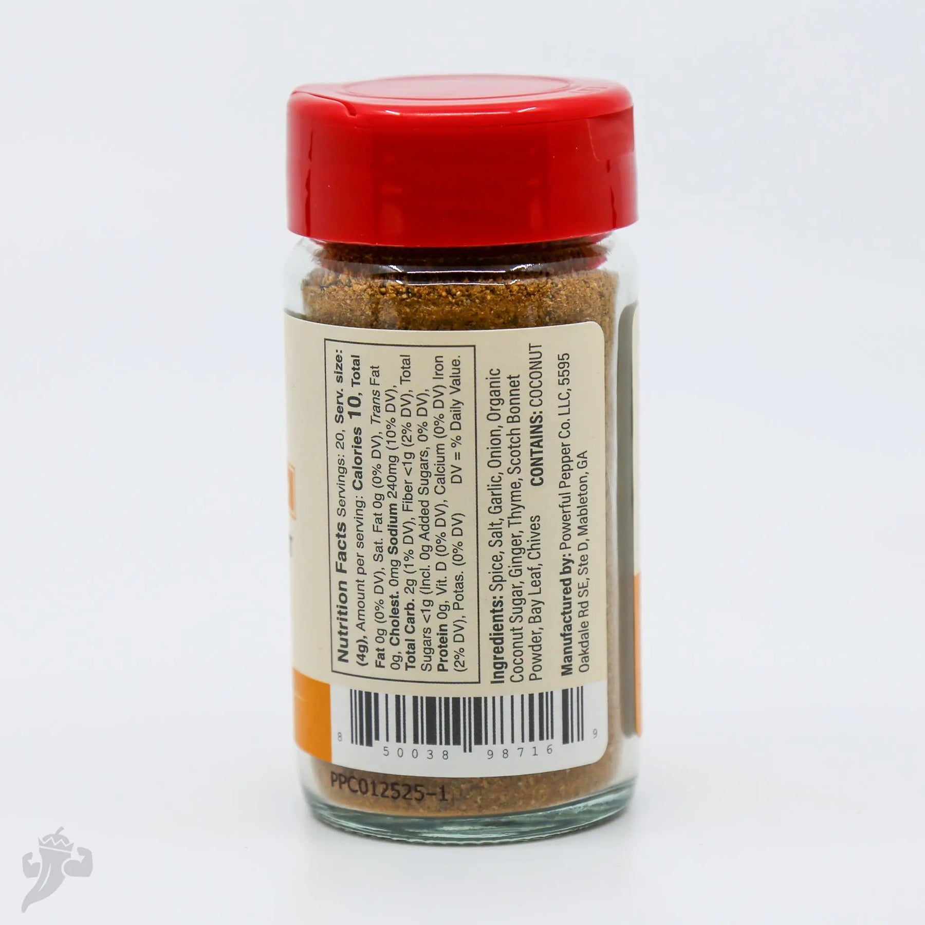 Glass jar of Taco Mix seasoning with a red lid and ingredient label.
