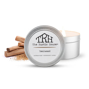 The Rustic House teakwood scented candle tin with sandalwood and amber notes