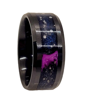 Black ceramic memorial ring with ashes, purple glow, and star constellations inlay.