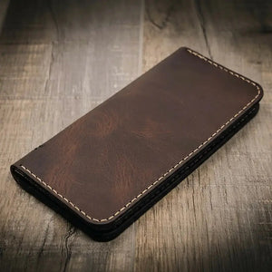 Brown full-grain leather long wallet with contrast stitching