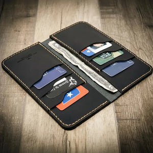 Mens black leather long wallet with multiple card slots and cash pockets.