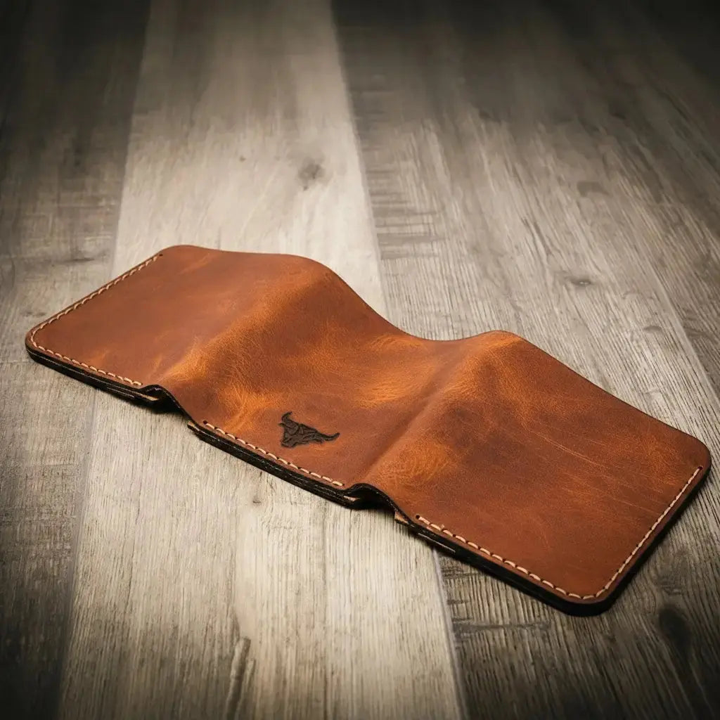 Brown leather trifold wallet with embossed bull logo