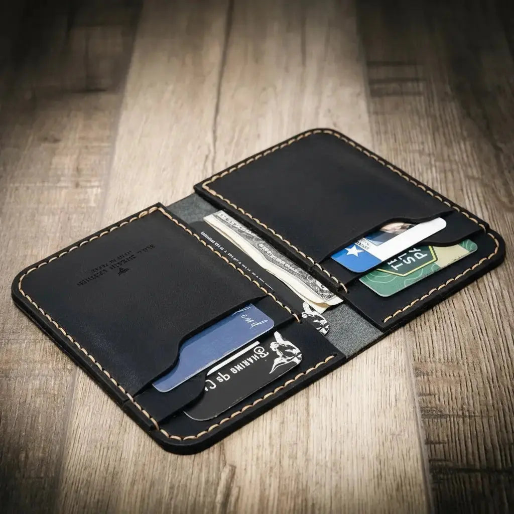 Black leather minimalist vertical wallet with card slots and cash pocket