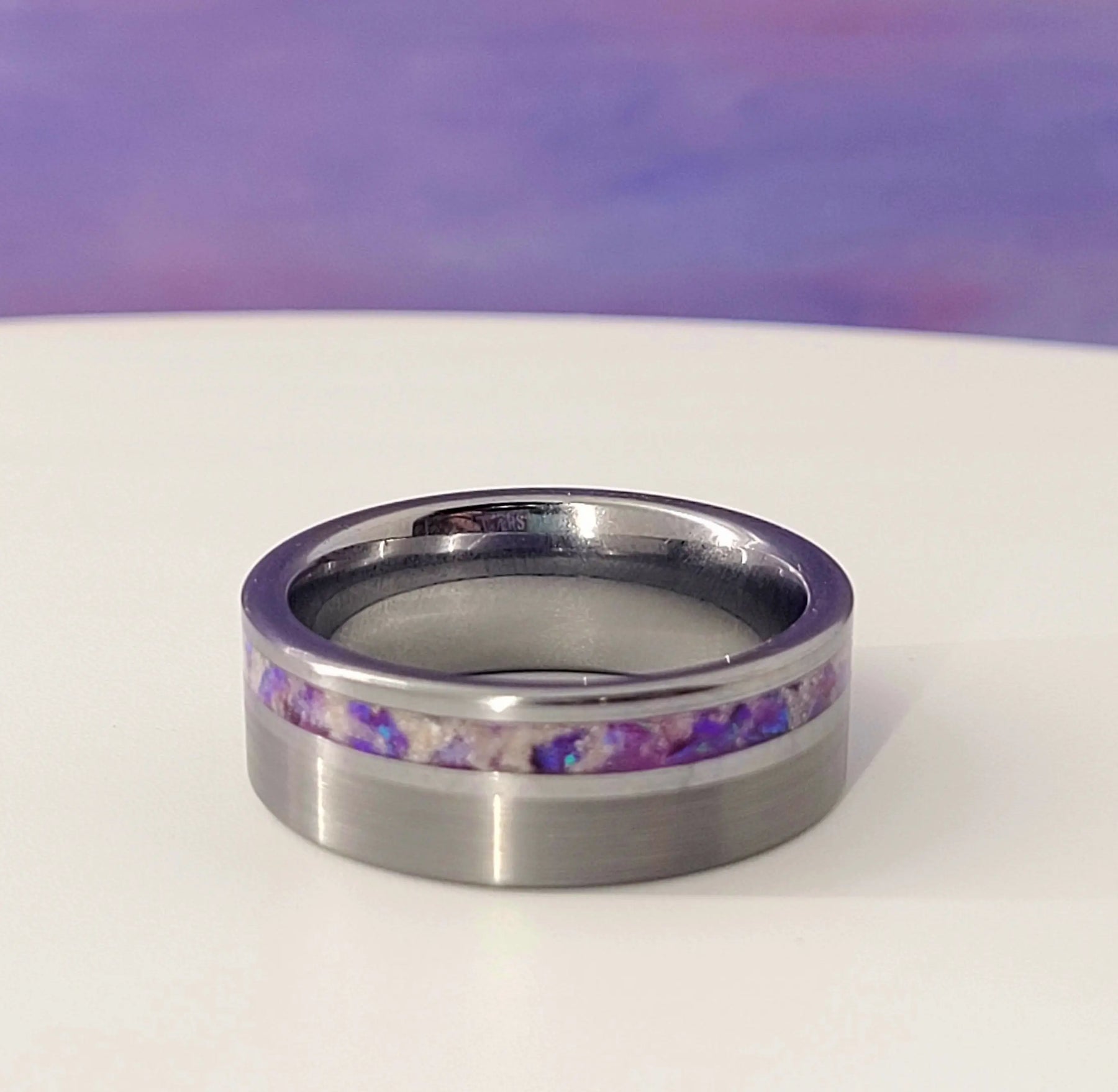 Silver tungsten memorial ring with purple ashes inlay.