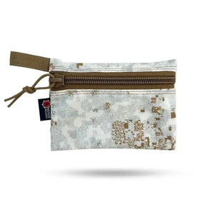 Digital camouflage flat zipper pouch with brown zipper and tan tab.