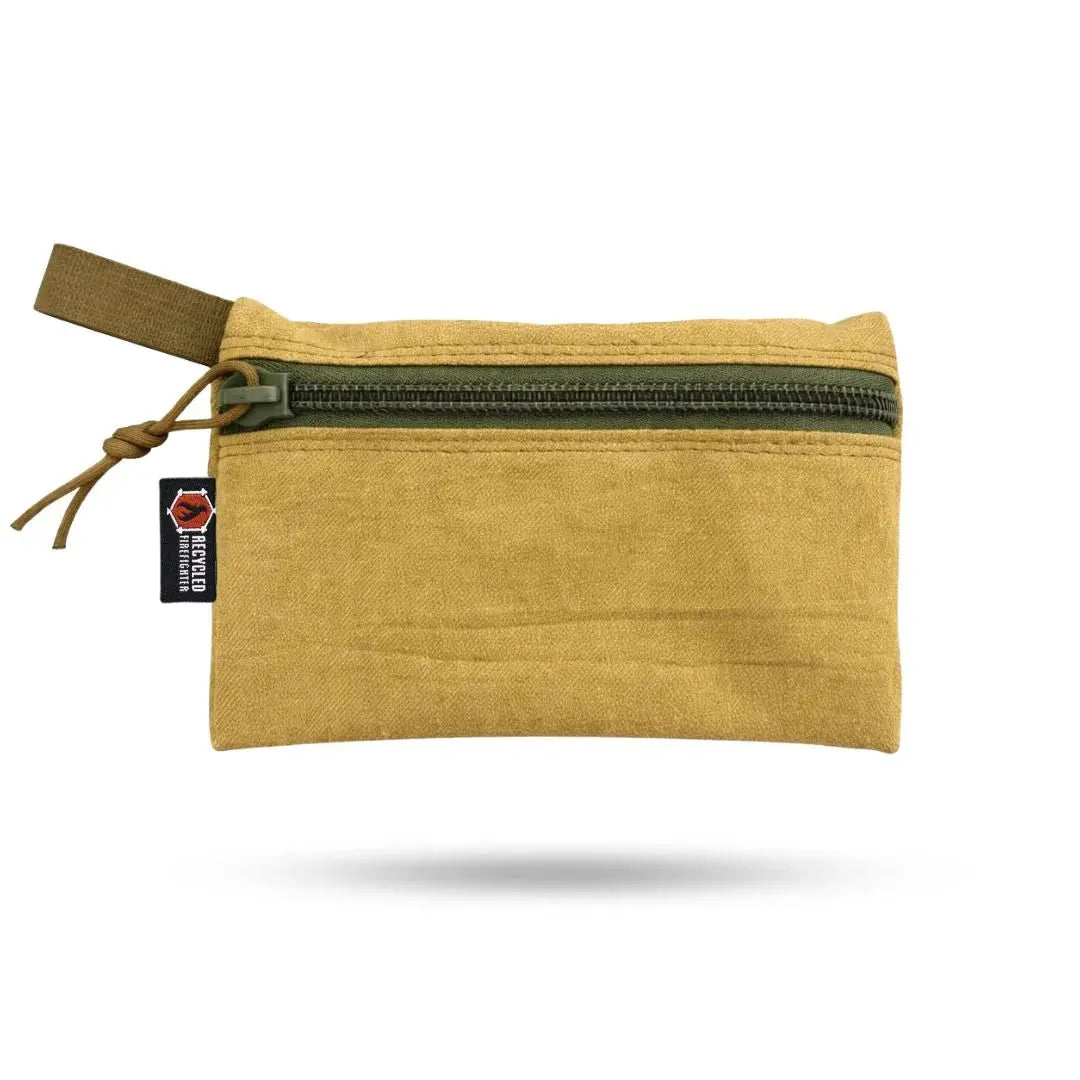 Small tan fabric zippered pouch with Recycled Firefighter label and paracord.