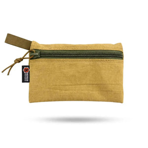 Small tan fabric zippered pouch with Recycled Firefighter label and paracord.