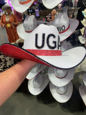 White UGA hat with black rhinestone letters and red rhinestone brim.