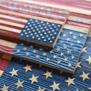 Rustic wooden American flags with painted stars and stripes