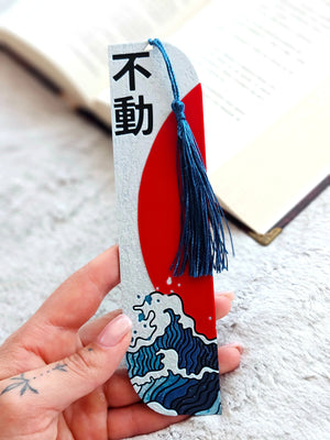 Japanese wave bookmark with red sun and kanji art, featuring a blue tassel. Handmade bookmark by Main Street Collective.