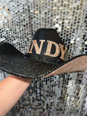 Black cowboy hat with VANDY in champagne rhinestones and rhinestone trim.