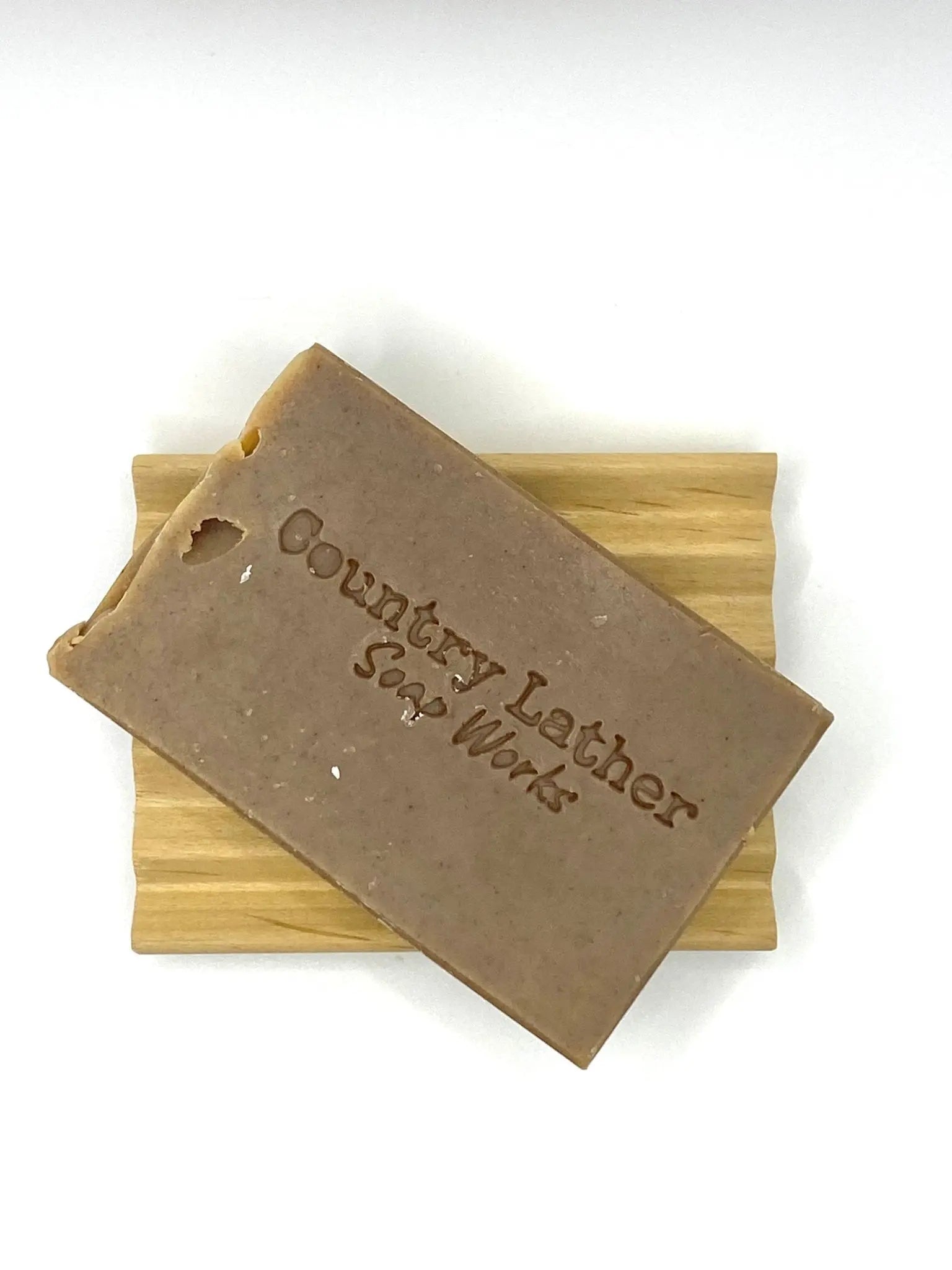 Vanilla Sandalwood soap bar on wood dish