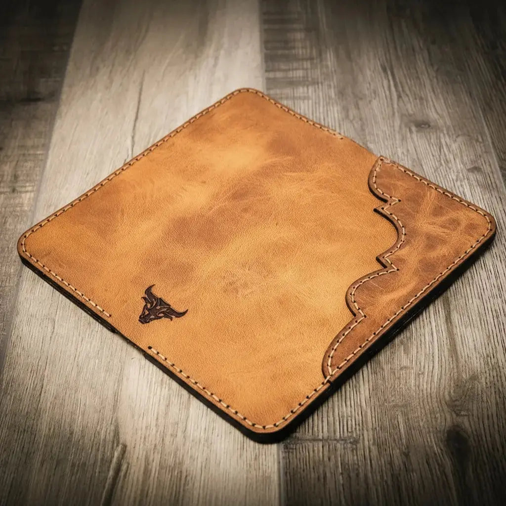 Western long wallet with bull emblem, made of brown full-grain leather.