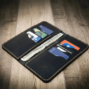Western Long Wallet in black leather, open with cards and cash.