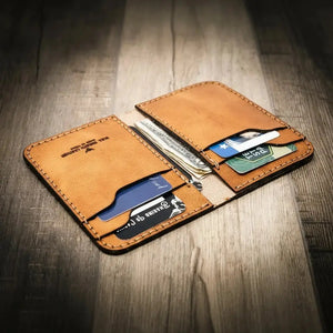 Brown leather bifold wallet with multiple card slots and cash pockets