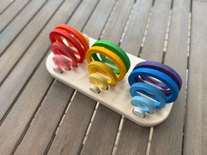 Maple Play wooden tray designed to organize Grapat Nest Rings