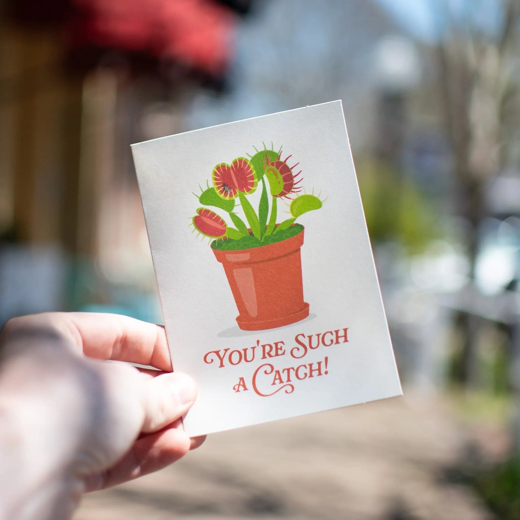 Greeting card with a Venus flytrap and "You’re Such A Catch" text.