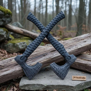 Damascus steel axe head with wood handle on rustic wood surface