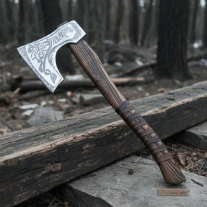 Carbon steel steel axe head with wood handle on rustic wood surface