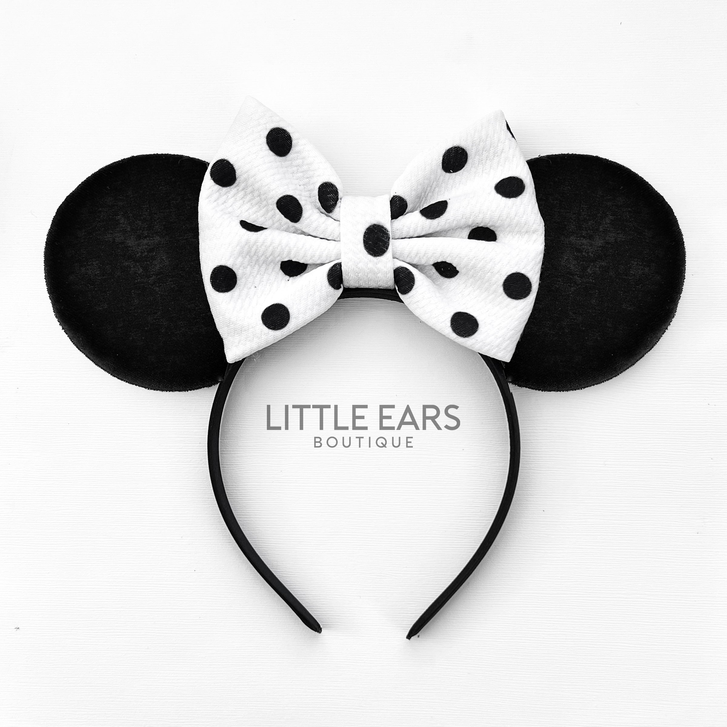 Black dotted bow handmade theme park ears by Little Ears Boutique