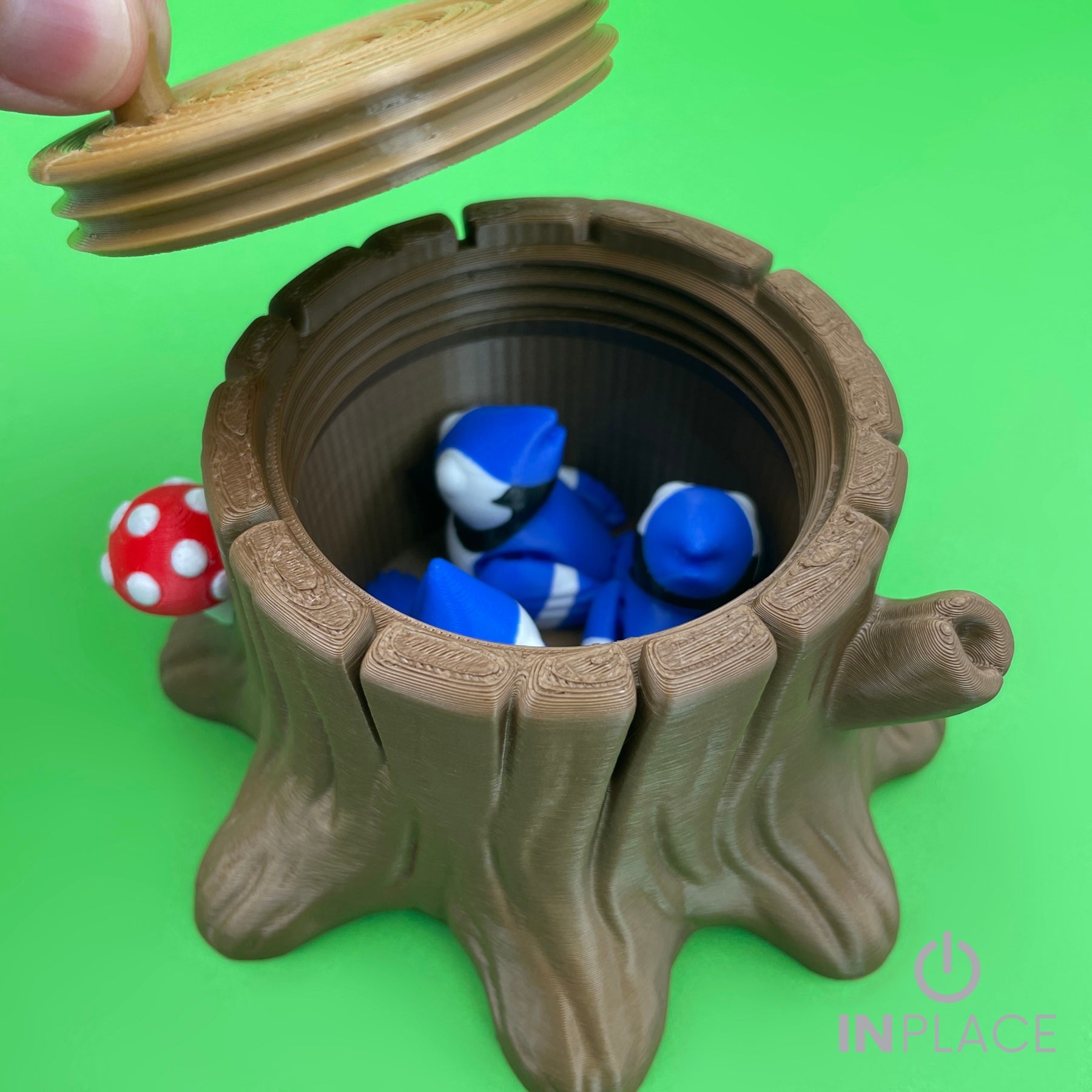 Blue jay tree stump playset storing the birds inside