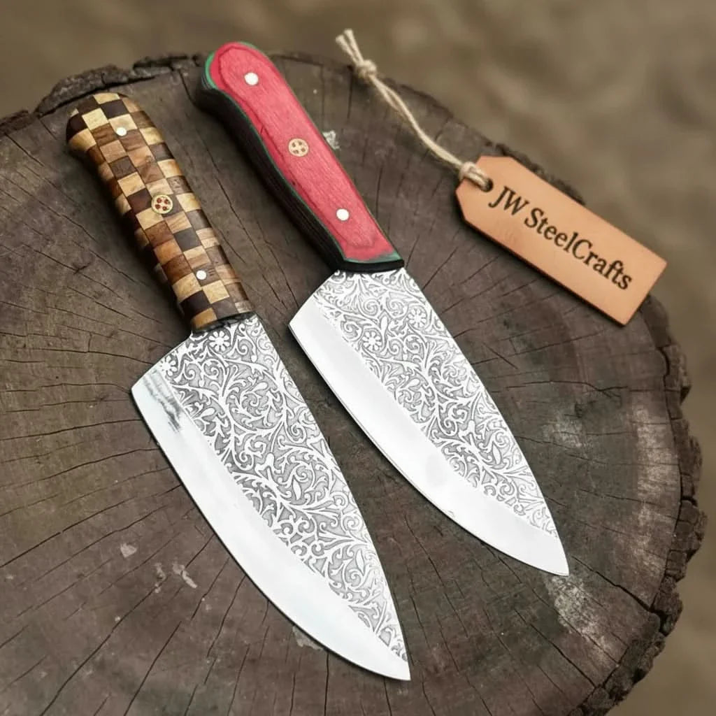 Handmade damascus steel knife with wood handle on dark surface