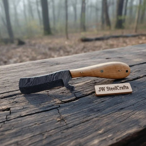 Handmade damascus steel knife with wood handle on dark surface