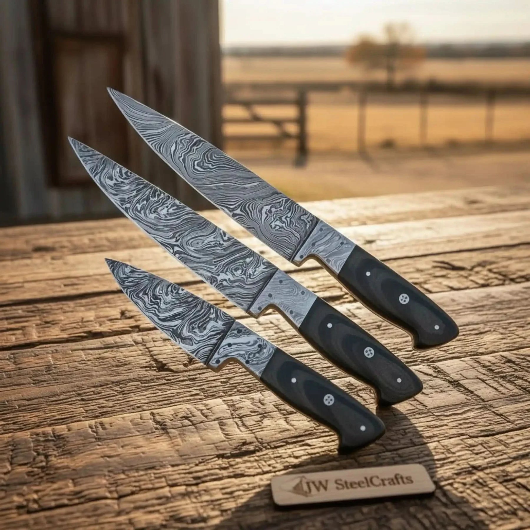 Handmade damascus steel knife with micarta handle on dark surface
