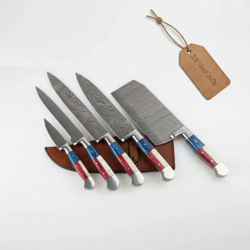 Handmade damascus steel knife with premium handle on dark surface