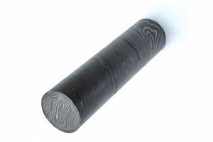 Handmade damascus steel knife with premium handle on dark surface