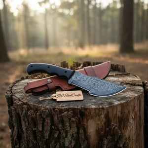 Handmade damascus steel knife with premium handle on dark surface