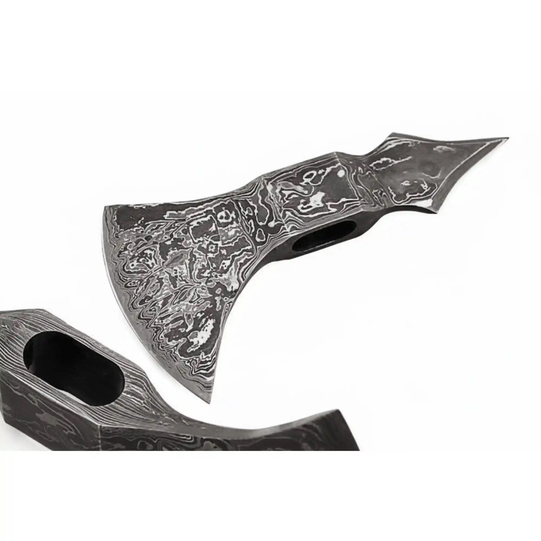 Damascus steel axe head with premium handle on rustic wood surface